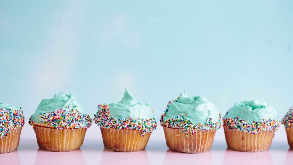 Cupcakes with blue frosting and sprinkles
